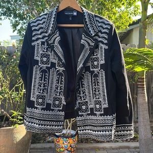 Super cute jacket. Too small for me.